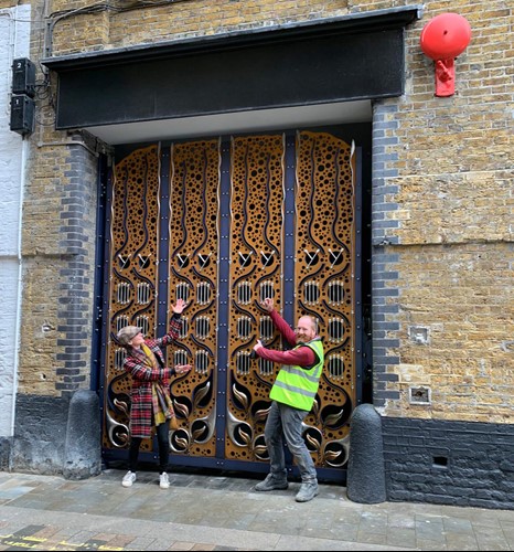 Bex Simon and Chris Brammall with new gates at Brewers Yard, London
