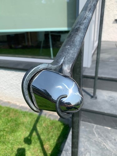 bespoke handrail with polished pebble