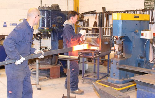 Garden sculpture tapers in the forge